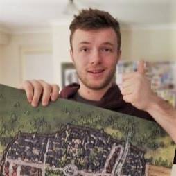 Picture Shows Ross McConnell Founder of 2 Minute Tabletop holding a map