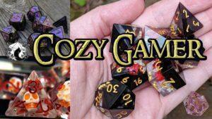 Image contains gaming dice sets and the words Cozy Gamer